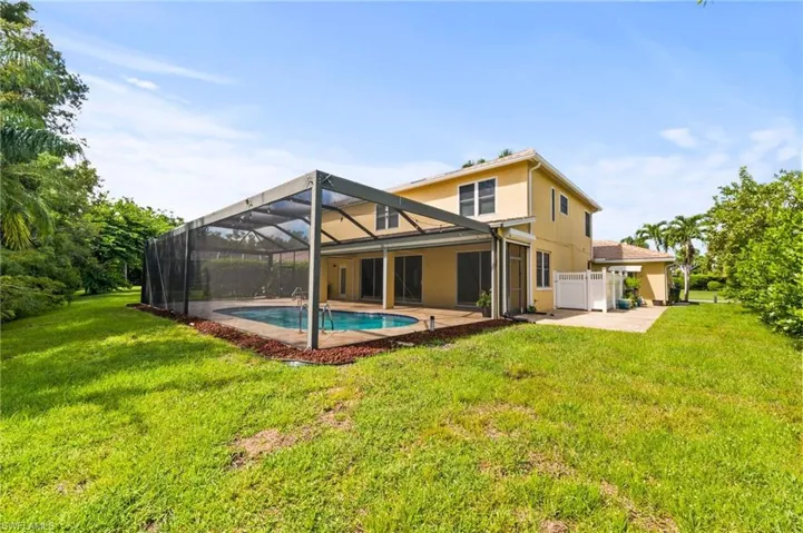 Rear of pool cage with picture window screen