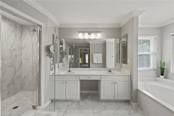 Primary Bath room with Dual Sinks & Separate Updated shower and soaking tub