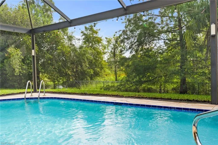 Sparkling Pool with Picture Window Screen on the Preserve