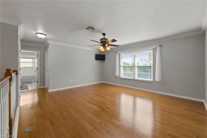 Loft with gleaming wood floors