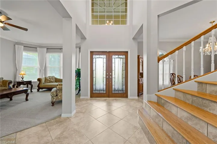 Formal Entry with Two Story Foyer and Impact front doors