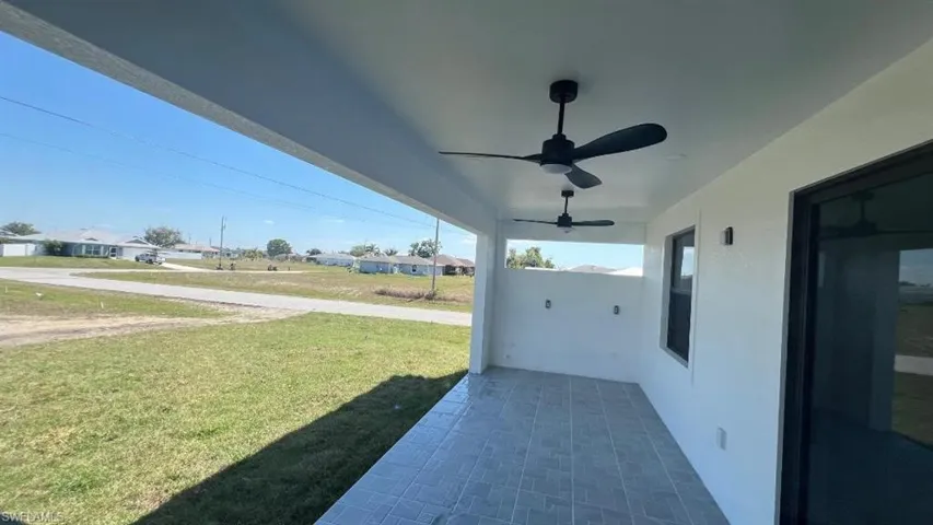 View of patio with ceiling fan