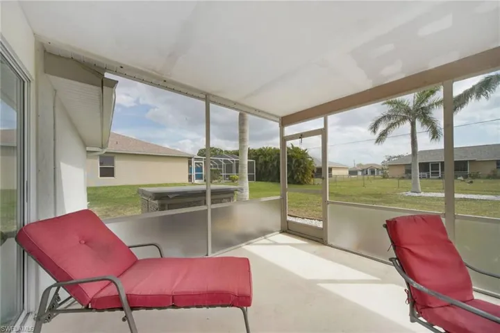 Sunroom with a residential view