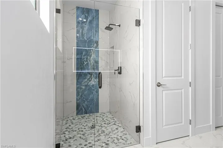 Bathroom with an enclosed shower