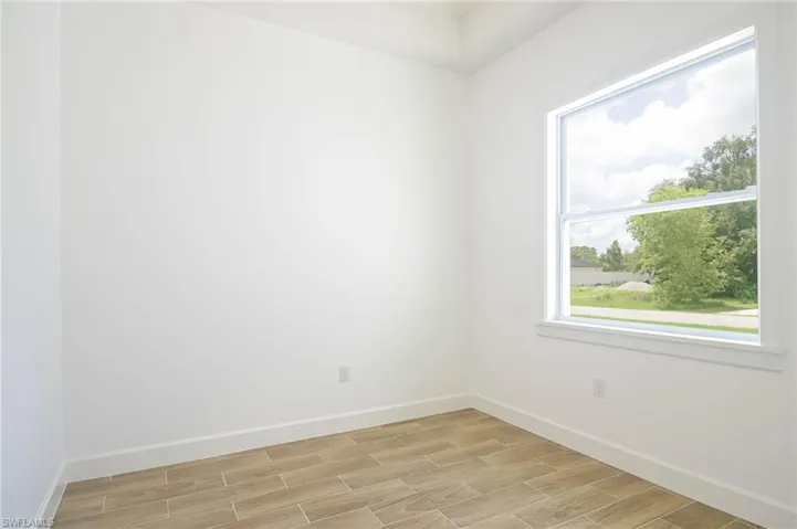 Empty room featuring light hardwood / wood-style floors