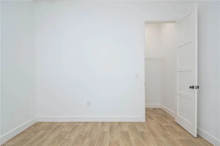Spare room featuring light hardwood / wood-style flooring