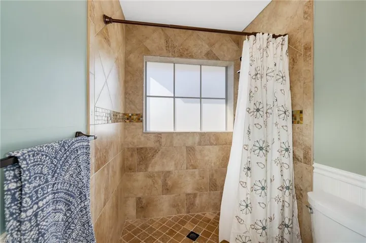 Tiled shower upstairs bath