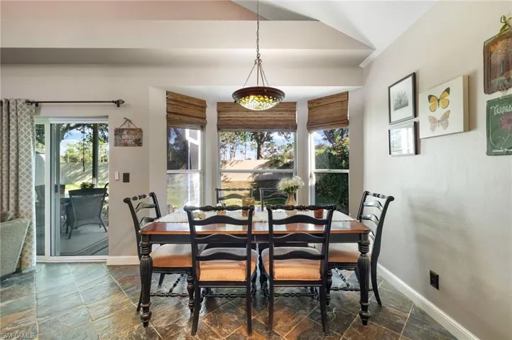 Dining area with window to private yard