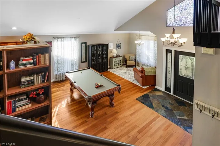 View from staircase -Wood flooring and soaring ceilings