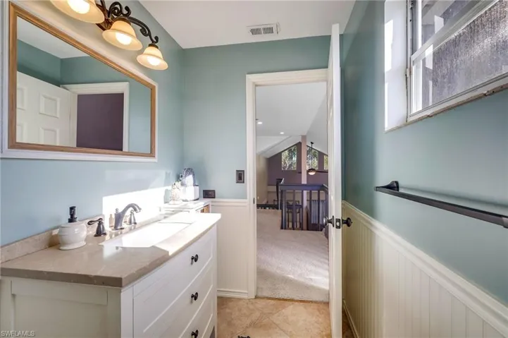 Upstairs Bathroom with vanity, tile floors