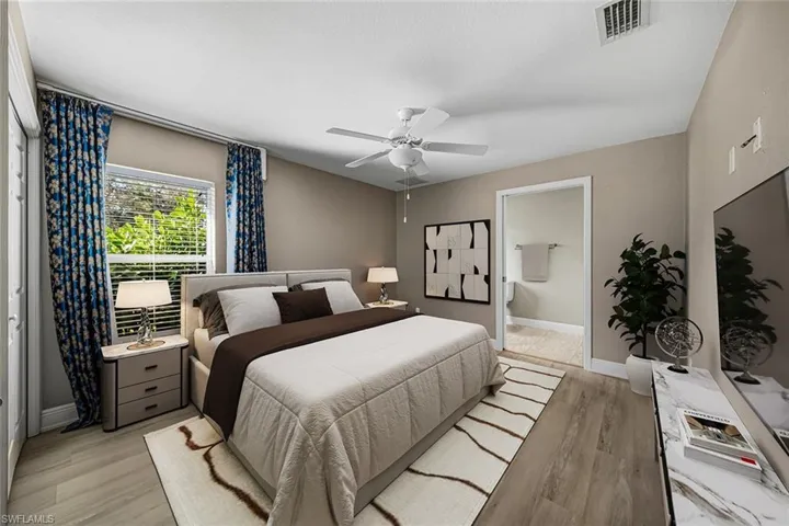 Bedroom featuring light wood-style flooring and ceiling fan