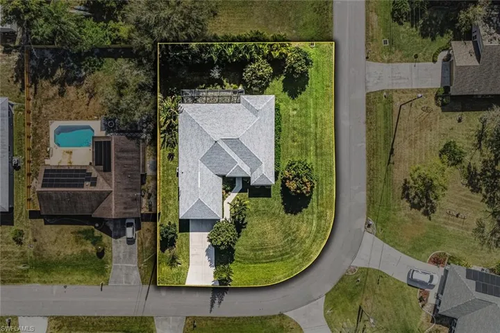 Aerial overview of property's location with property parcel outlined