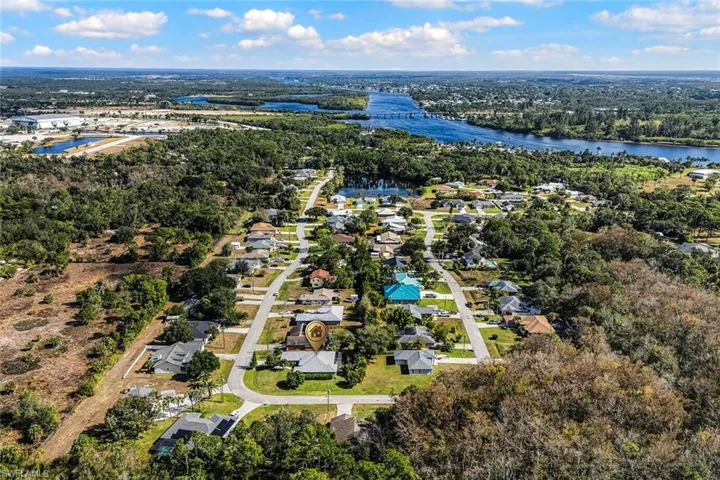 Aerial view of residential area with a nearby body of water
