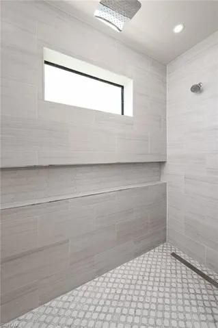 Bathroom with a tile shower