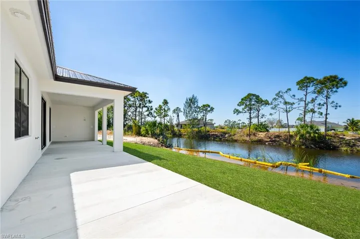 View of patio / terrace with a water view