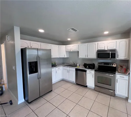 221-223  Ivan S AVE, Lehigh Acres, FL 33973