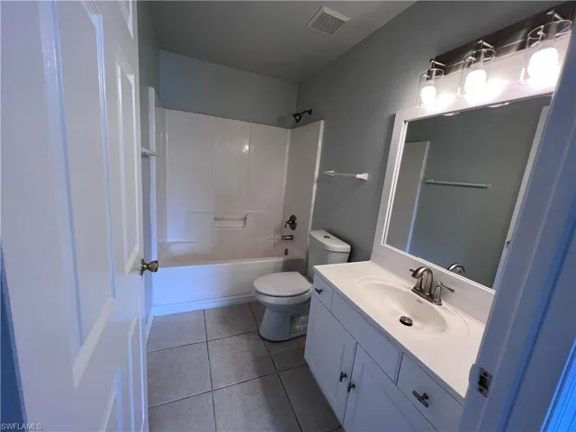 221-223  Ivan S AVE, Lehigh Acres, FL 33973