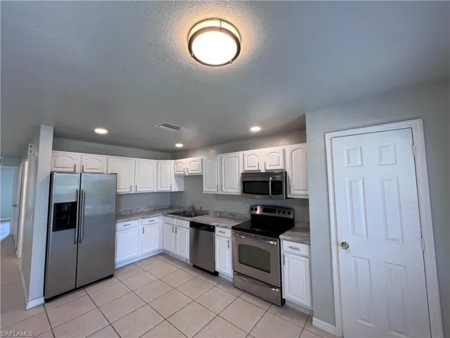 221-223  Ivan S AVE, Lehigh Acres, FL 33973