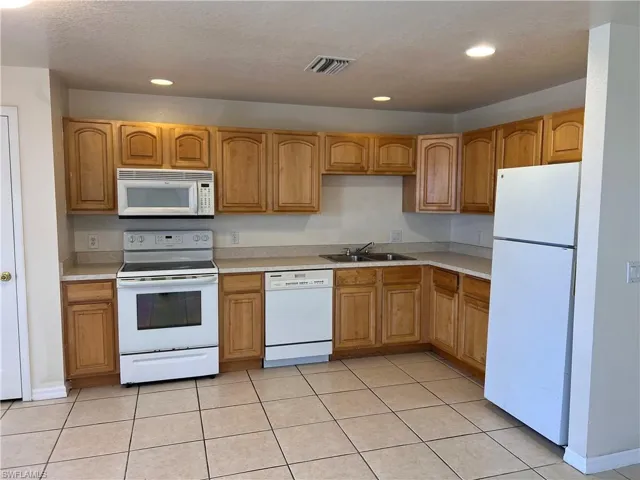 221-223  Ivan S AVE, Lehigh Acres, FL 33973