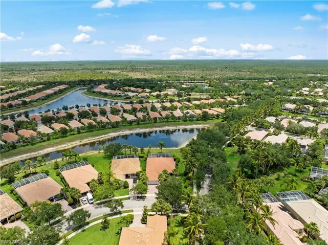 View of property location with nearby suburban area and a nearby body of water