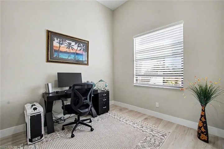 Office featuring wood finished floors