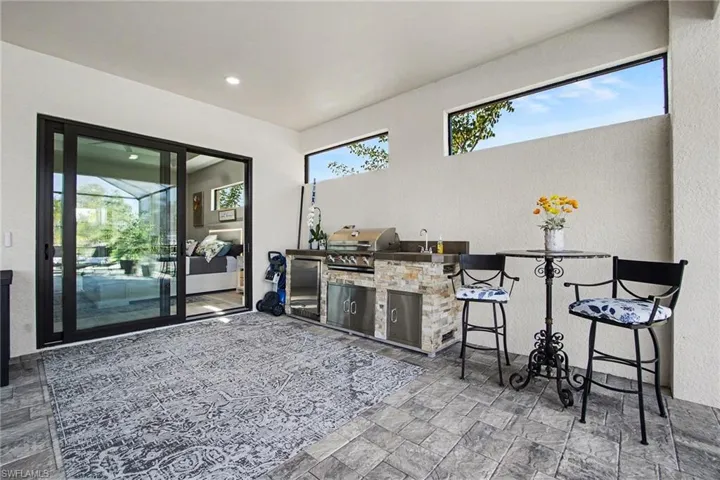 View of patio with an outdoor kitchen