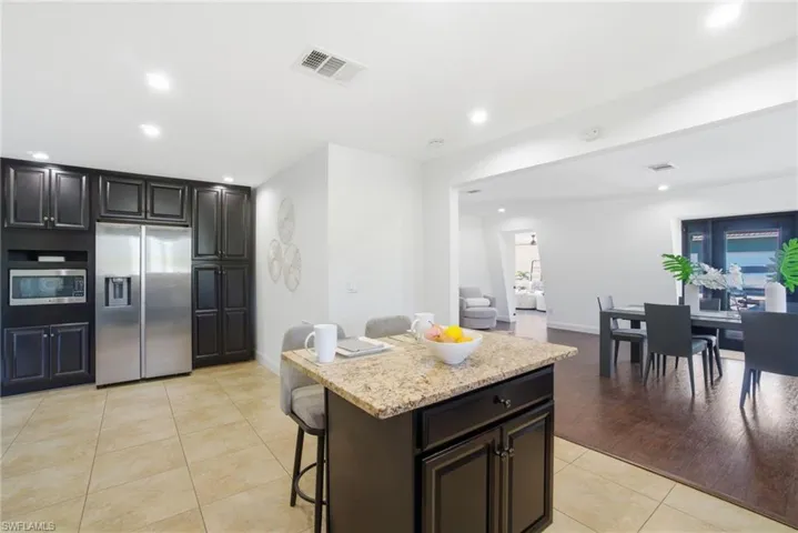 The island serves as extra prep space as well as an additional dining space for those quick bites