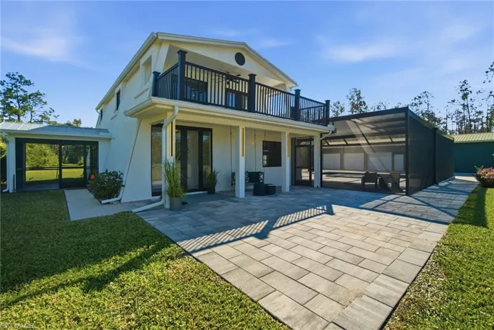 A front porch swing awaits, and welcomes you to take in the beauty and enjoy the breezes