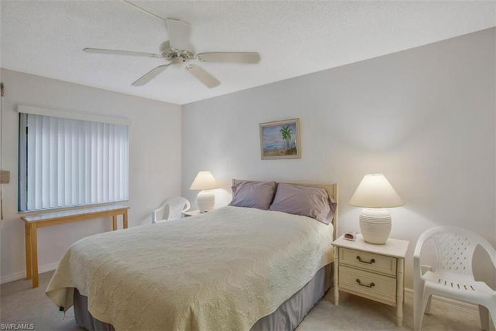 spacious main bedroom with an en suite and walk in shower