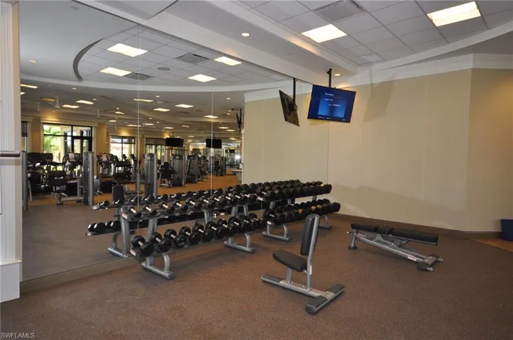 Exercise room featuring a drop ceiling