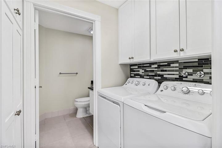 Convenient laundry and guest bath off kitchen