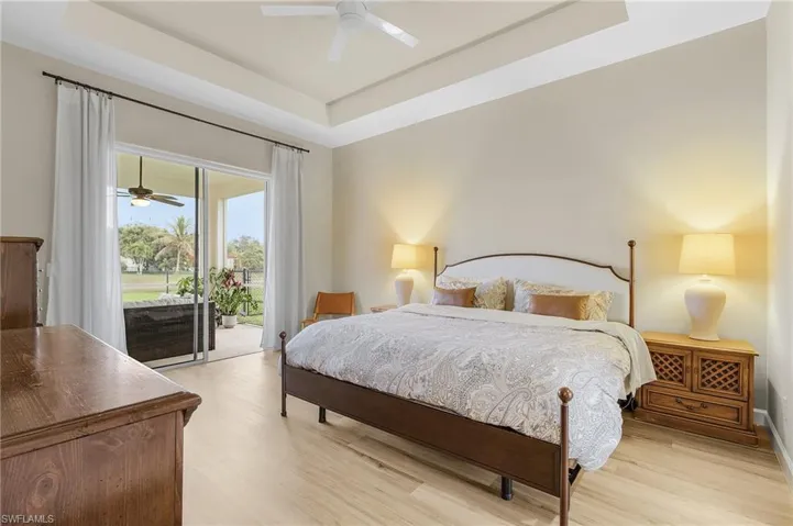 Huge Primary Bedroom with Seating Area and Sliders out to the Lanai