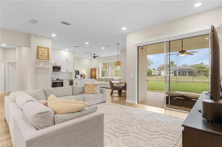 Open Concept Living with Large Sliding Doors outside into the Tiled Lanai