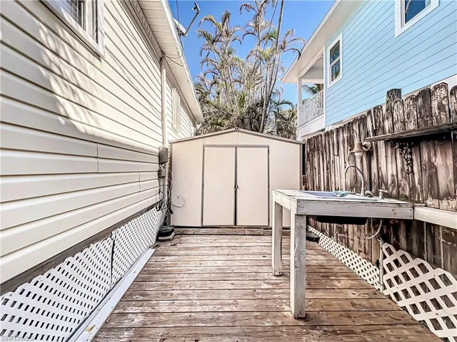 Wooden terrace with a storage unit