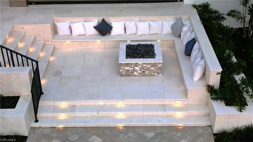 Enjoy entertaining around the built in gas fireplace which has beautiful evening lighting.