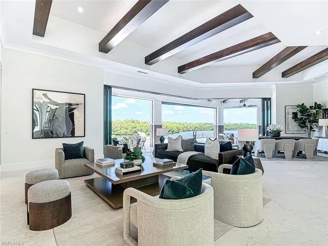 Impact glass patio sliders stack and tuck into the walls.