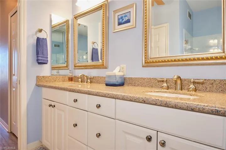 Bathroom with vanity and tile flooring