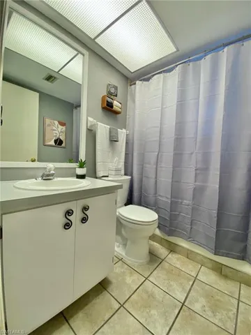 Guest bathroom with a tub shower combo.