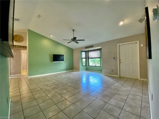 Living room looking towards the hall to the guest bedrooms and bath.