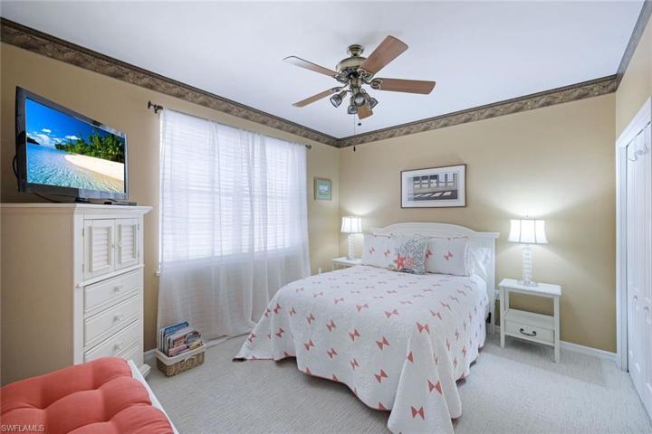 Guest bedrooms are privately tucked away on the opposite side of the home from the primary suite.