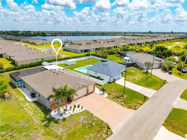 Quiet residential street with newer homes throughout the neighborhood, offering a peaceful and desirable Northwest Cape Coral location.