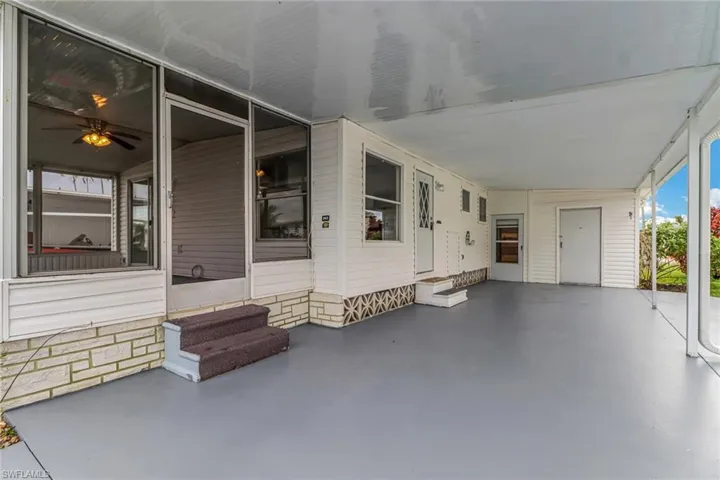 Covered Carport with Enough Space for a Car & Golf Cart!