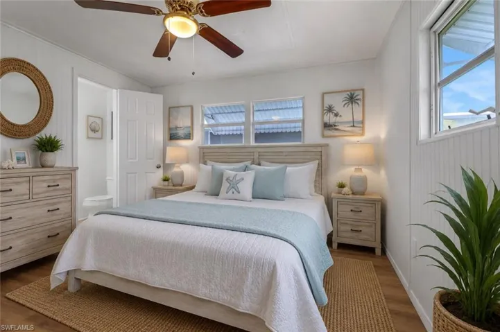 Virtually Staged Primary Bedroom with In-Suite Half Bathroom