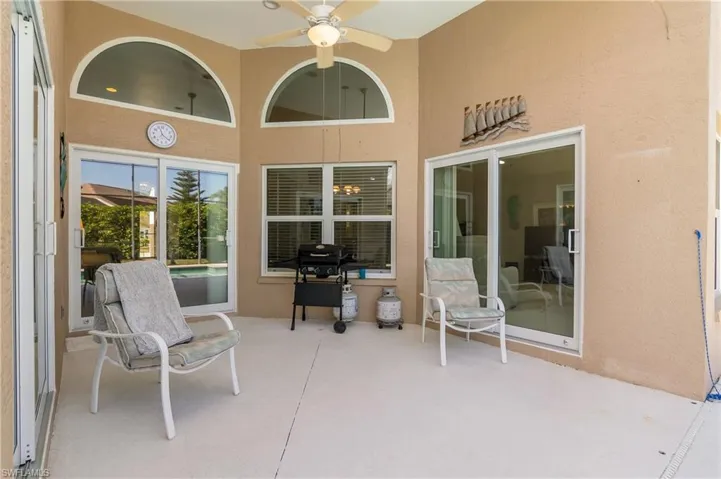 Covered gathering area overlooking pool