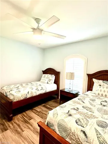Bedroom 3 featuring ceiling fan and hardwood / wood-style flooring