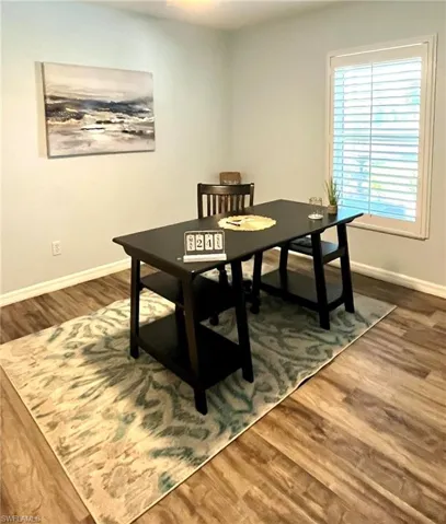 Bedroom 2 featuring dark hardwood / wood-style flooring