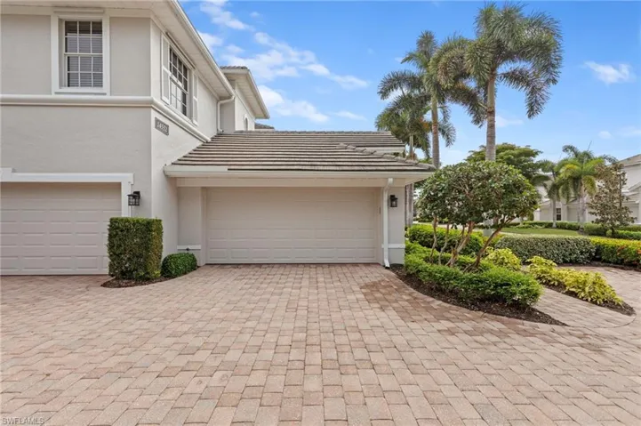 Garage with decorative driveway