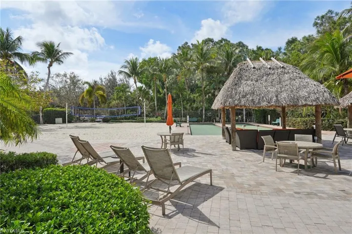 Surrounding community featuring a gazebo, a patio area, volleyball court, and a pool