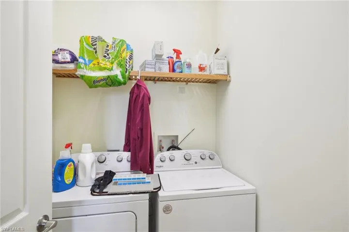 Laundry area featuring laundry area and independent washer and dryer