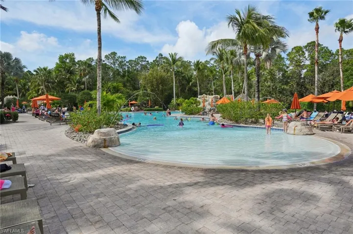 Community pool featuring a patio area